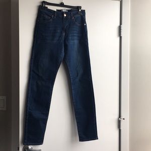 Medium wash mid rise skinny jeans from H&M